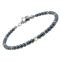 Bracciale in acciaio con pietre naturali in Ematite e vite centrale in oro 18 Kt (gr 0.03)