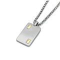 Pendente in acciaio godronato con oro 18Kt (gr 0.08)